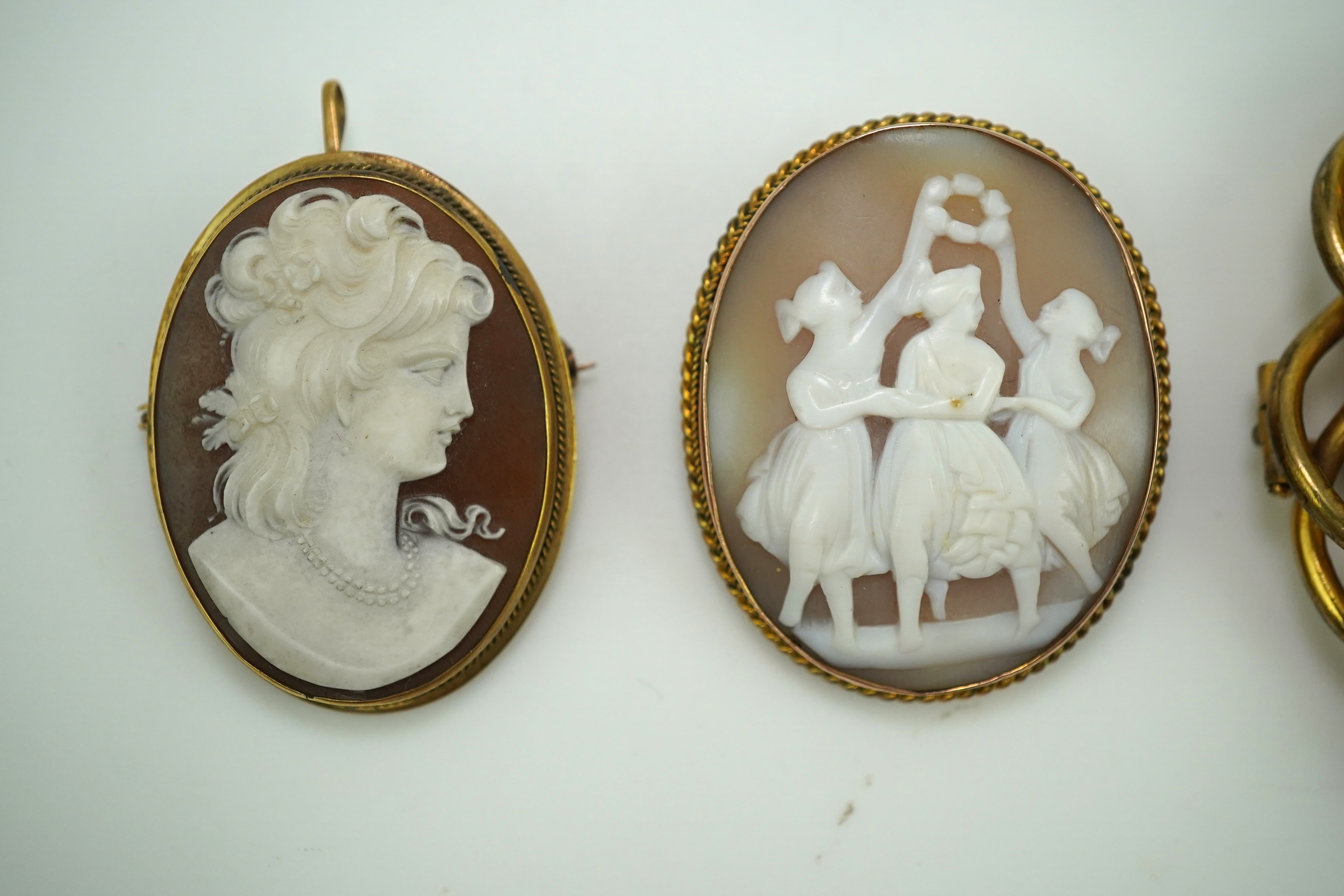 Three shell cameo brooches, 20th century